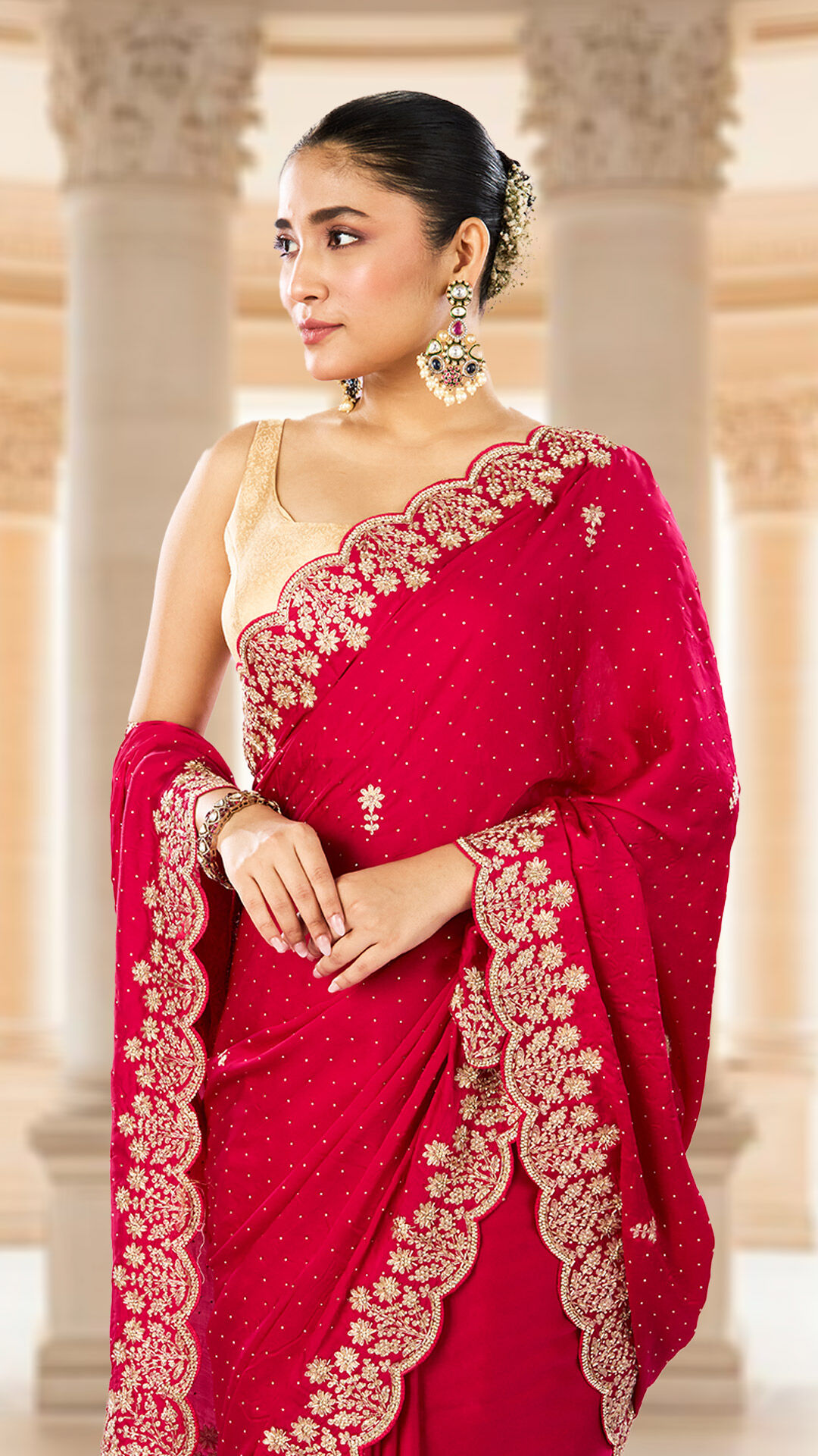 Women wearing tradition red saree with matching jwellary